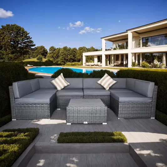 7 piece grey wicker patio sectional sofa with red cushions and coffee table